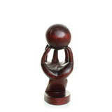 Wooden Globe in Hand Statue